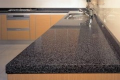 Good advice on how to remove scratches from a glossy kitchen surface